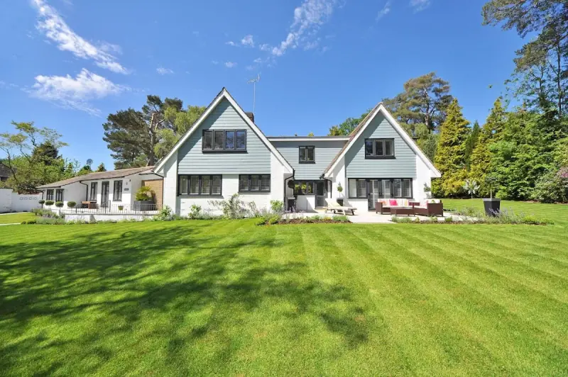 Well-maintained rental homes with green lawn